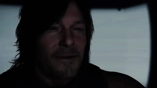 Woodkid与小岛秀夫在录音室讨论配乐细节，背景为《死亡搁浅2》的游戏画面