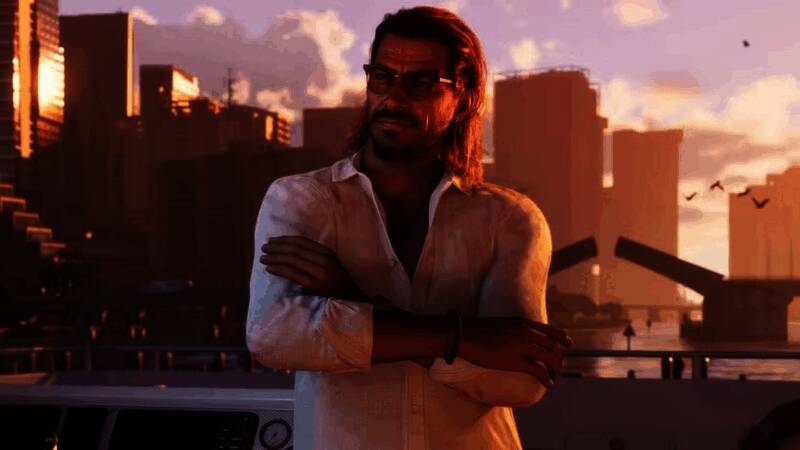 Take-Two CEO Strauss Zelnick在财报会议上发言的现场照片，背景屏幕显示GTA6艺术概念图